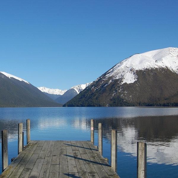 The Jetty at Kerr Bay looking across Nelson Lakes to snow covered Mt Robert