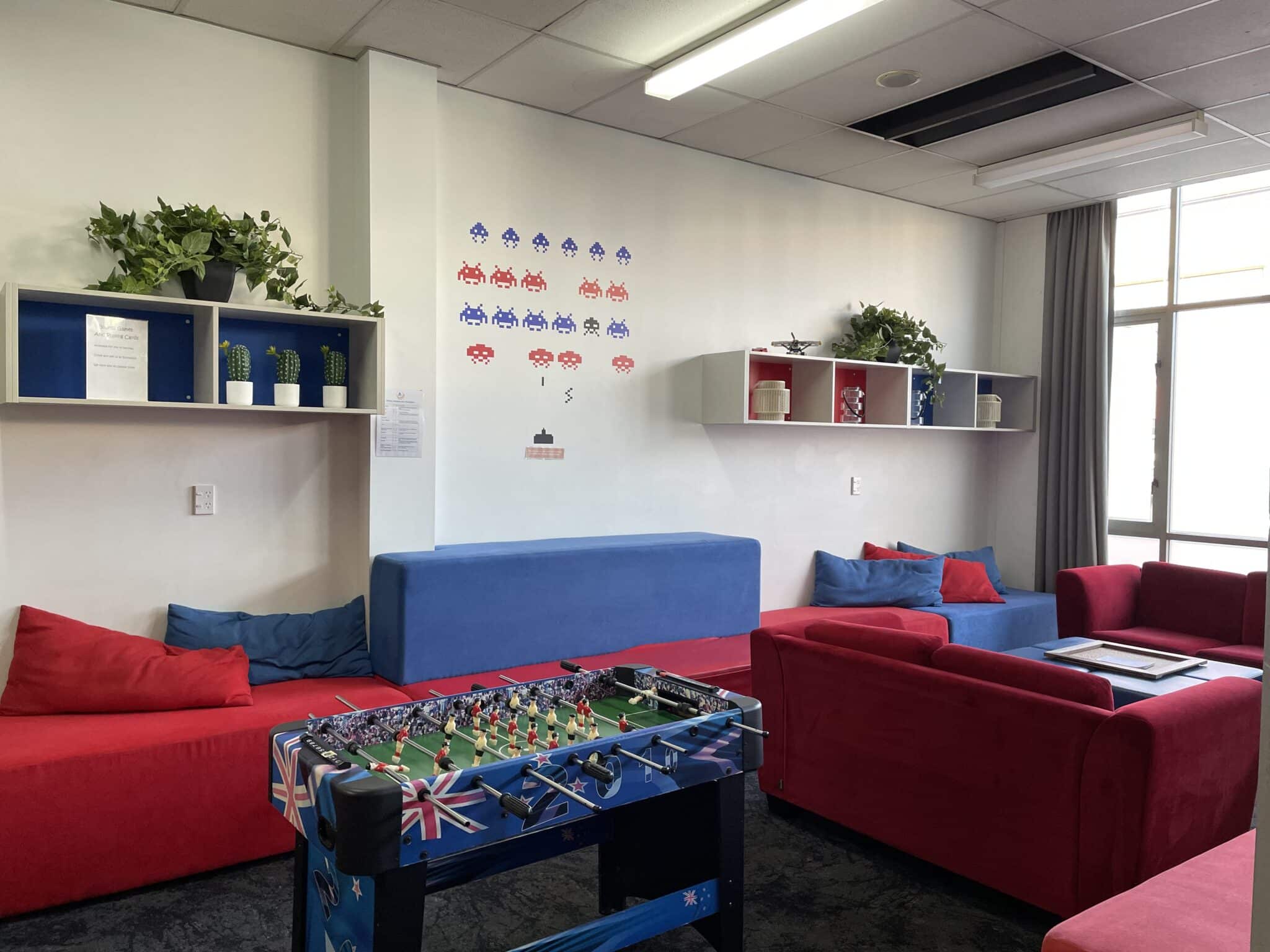 Lounge with Plants Large lounge with lots of seating options, Foosball and Games