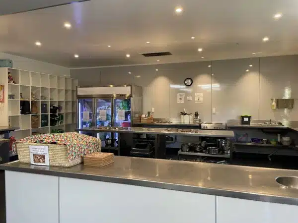 Cooking in the large well equipped kitchen at Accents YHA Hostel Nelson
